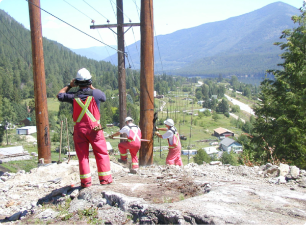 Employee working on new power lines. 